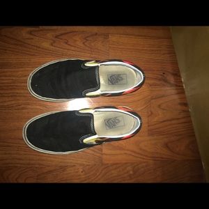 black flame slip on vans